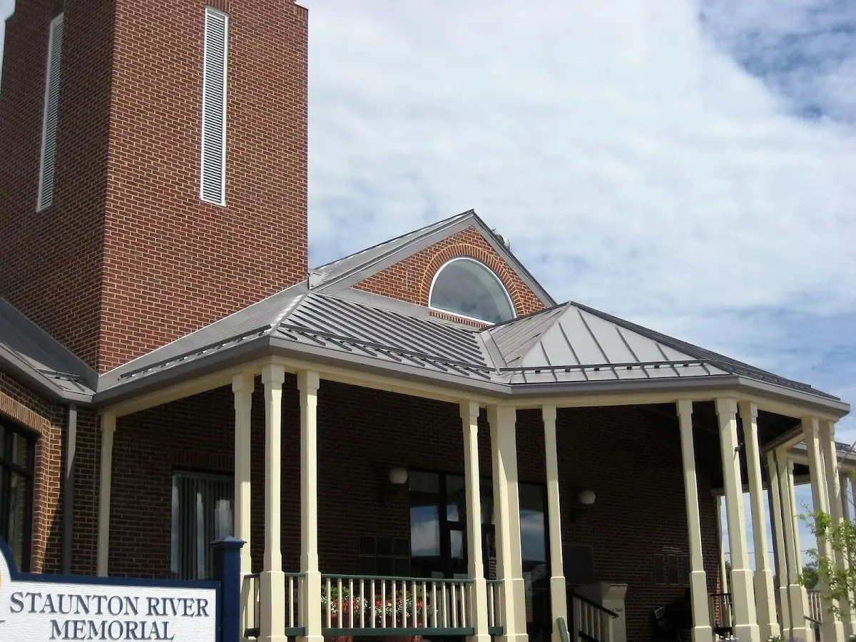 Skilled roofing craftsmen working on a residential roof in Nelsonville